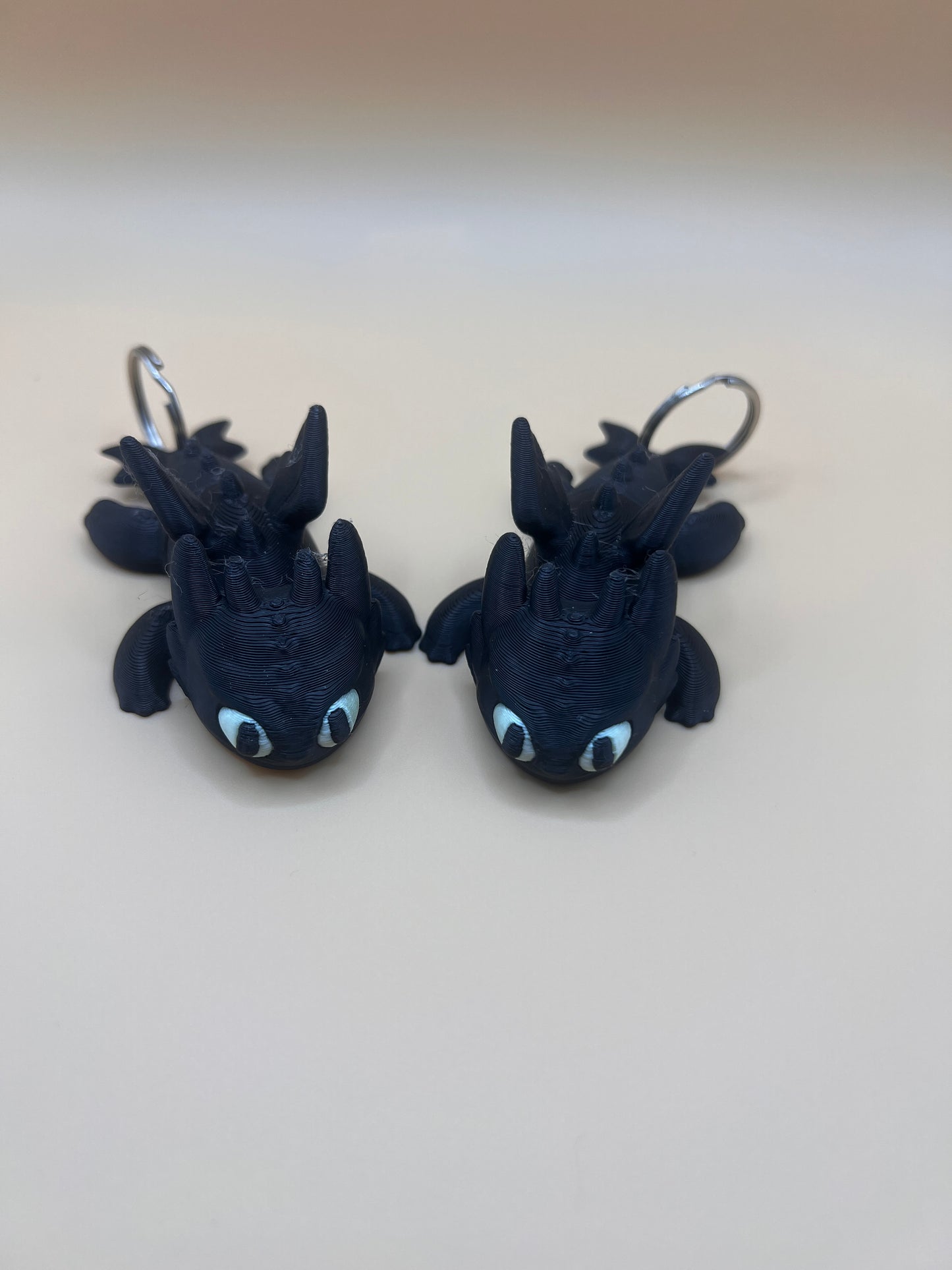 Shadow Ember Hatchling Keychain (Glow Eyes Edition)